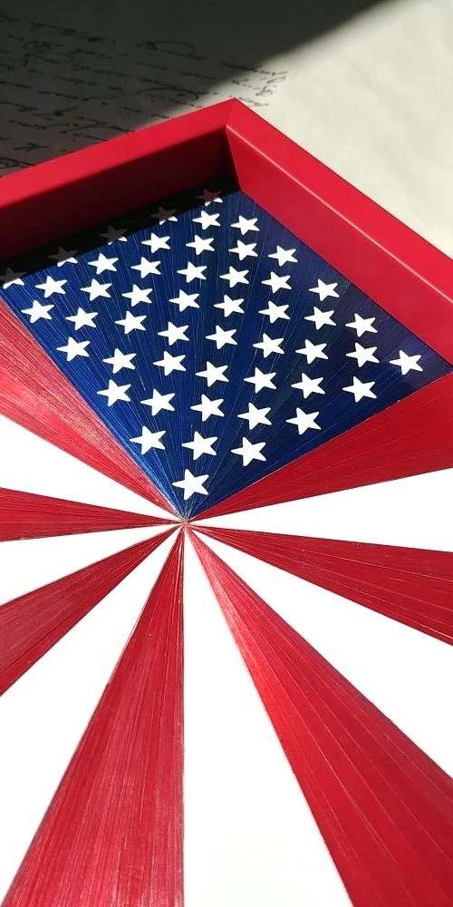 Interprétation du drapeau américain avec des bandes qui partent du centre