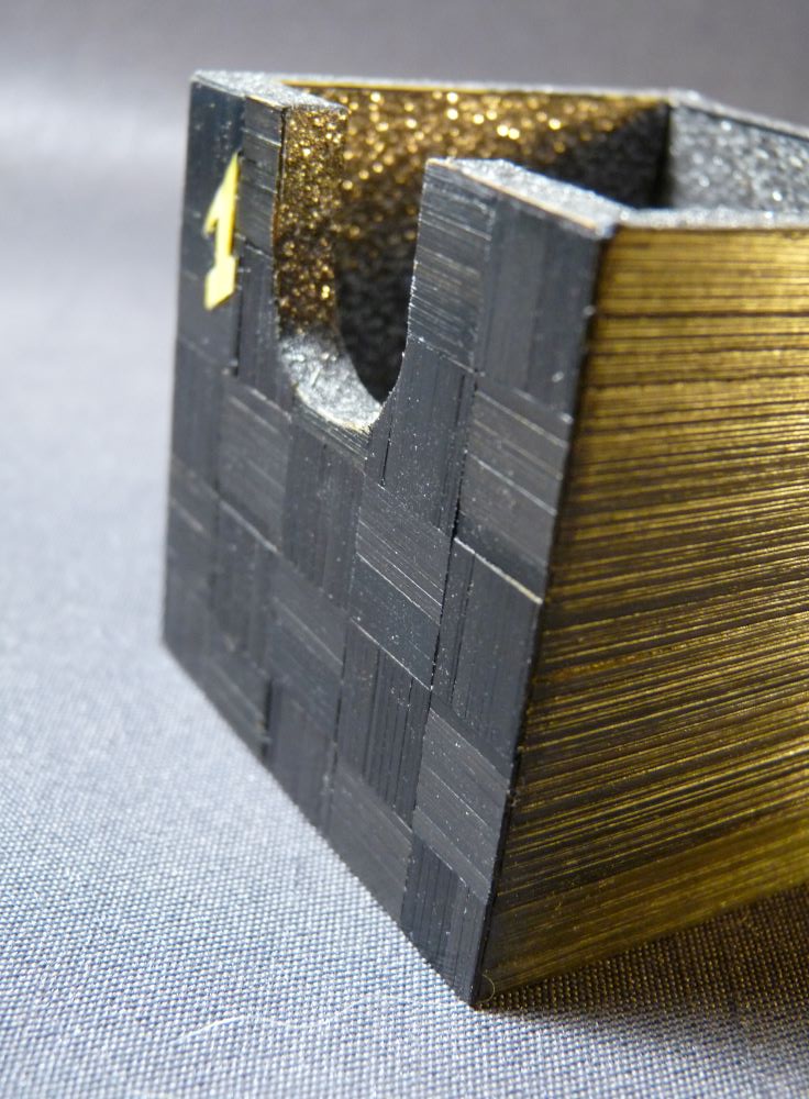 Avent Calendar with straw marquetry One day One pattern One color The first december Pattern : checkerboard (damier) Color : black (noir)