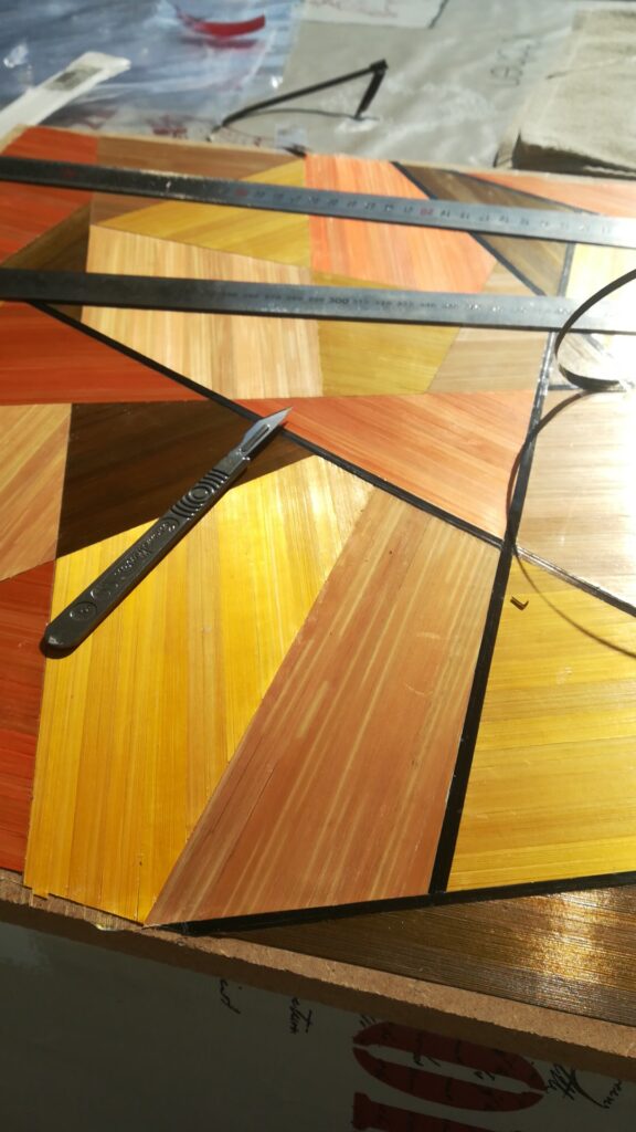 Création de la marqueterie de paille